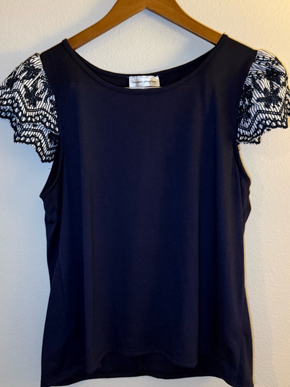 Navy Top with Black-and-White Lace Flutter Sleeves